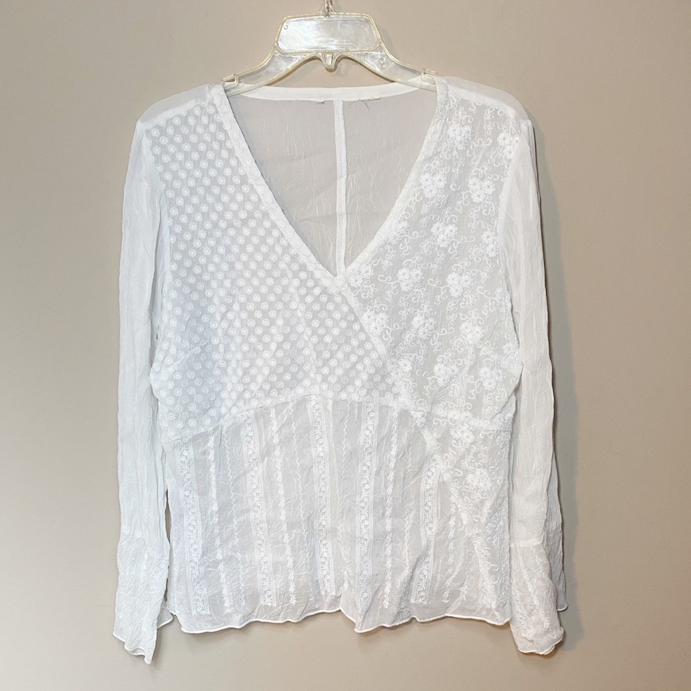White long sleeve blouse with embroidery detailing